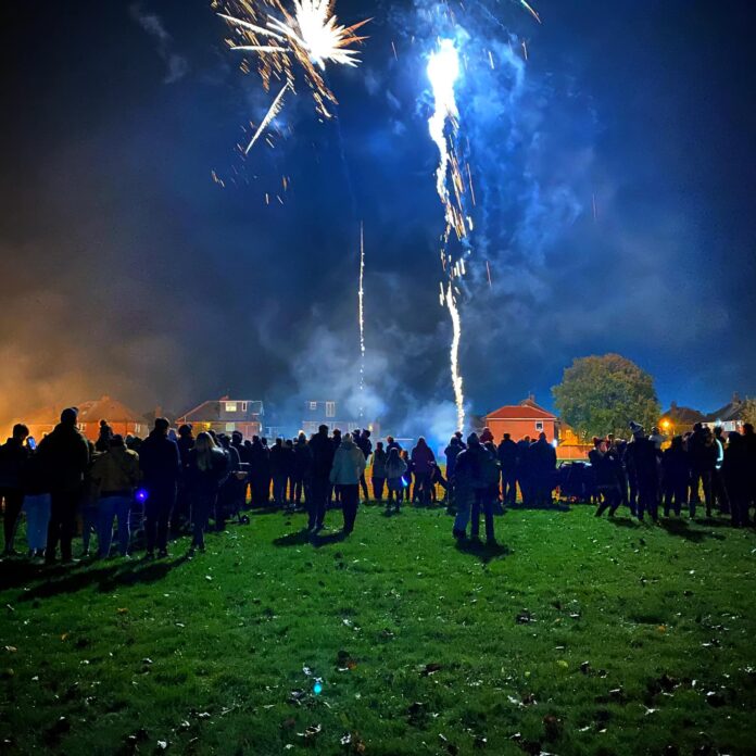 A group of people at our community bonfire event.